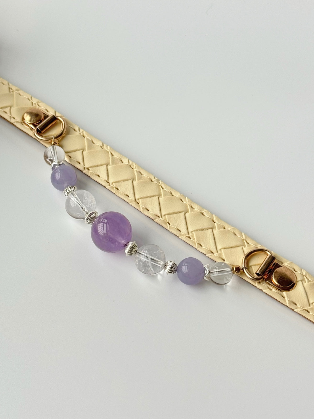Ivory pet collar with purple and clear natural stone arrangement