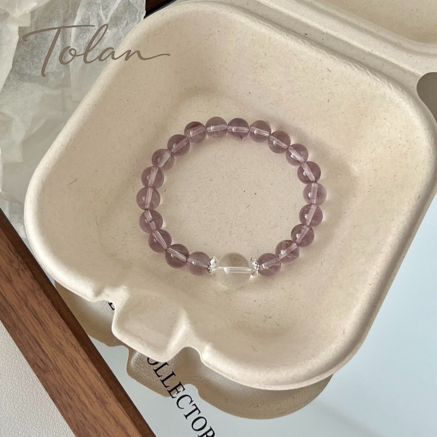 Lavender Bloom amethyst and rose quartz bracelet worn on wrist