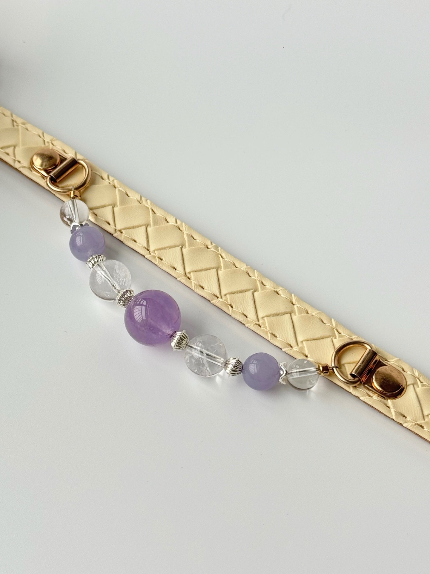 Ivory pet collar with purple and clear natural stone arrangement