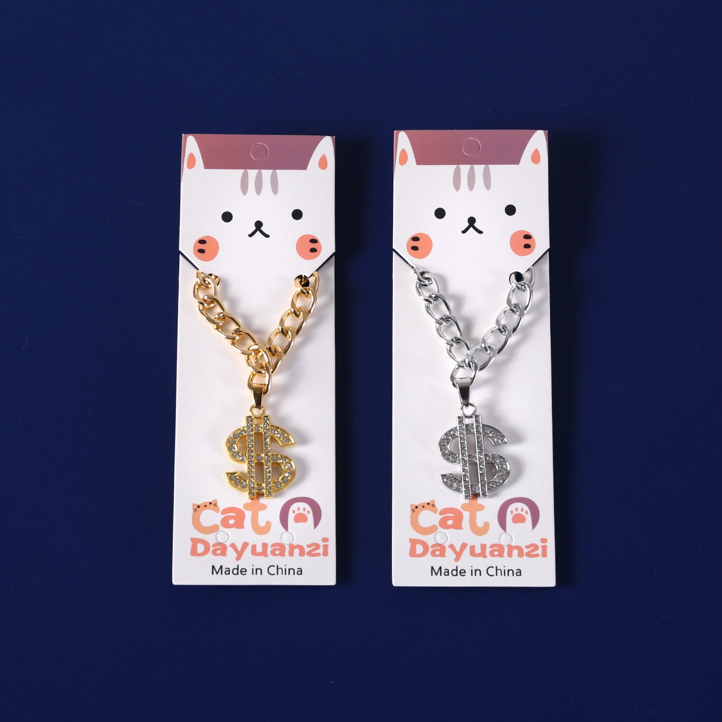 Gold and silver pet necklaces in display packaging