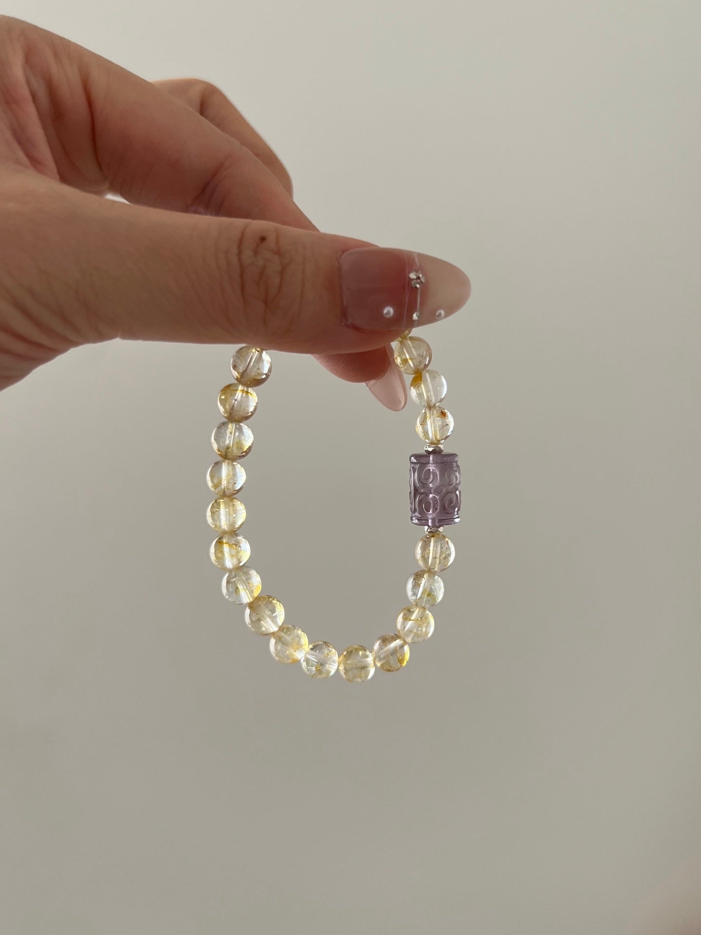 Purple patterned barrel bead bracelet